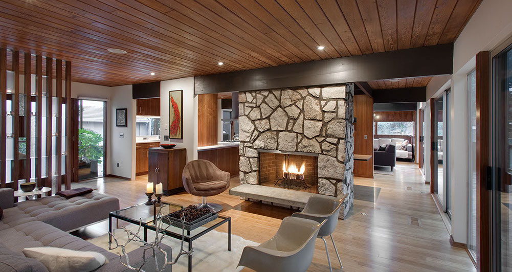 an image of modern rock fireplace, mid-century modern interior