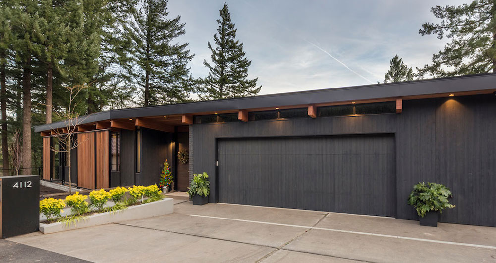 an image of a modern home exterior black and wood
